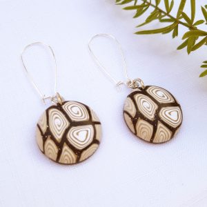 brown and white earrings